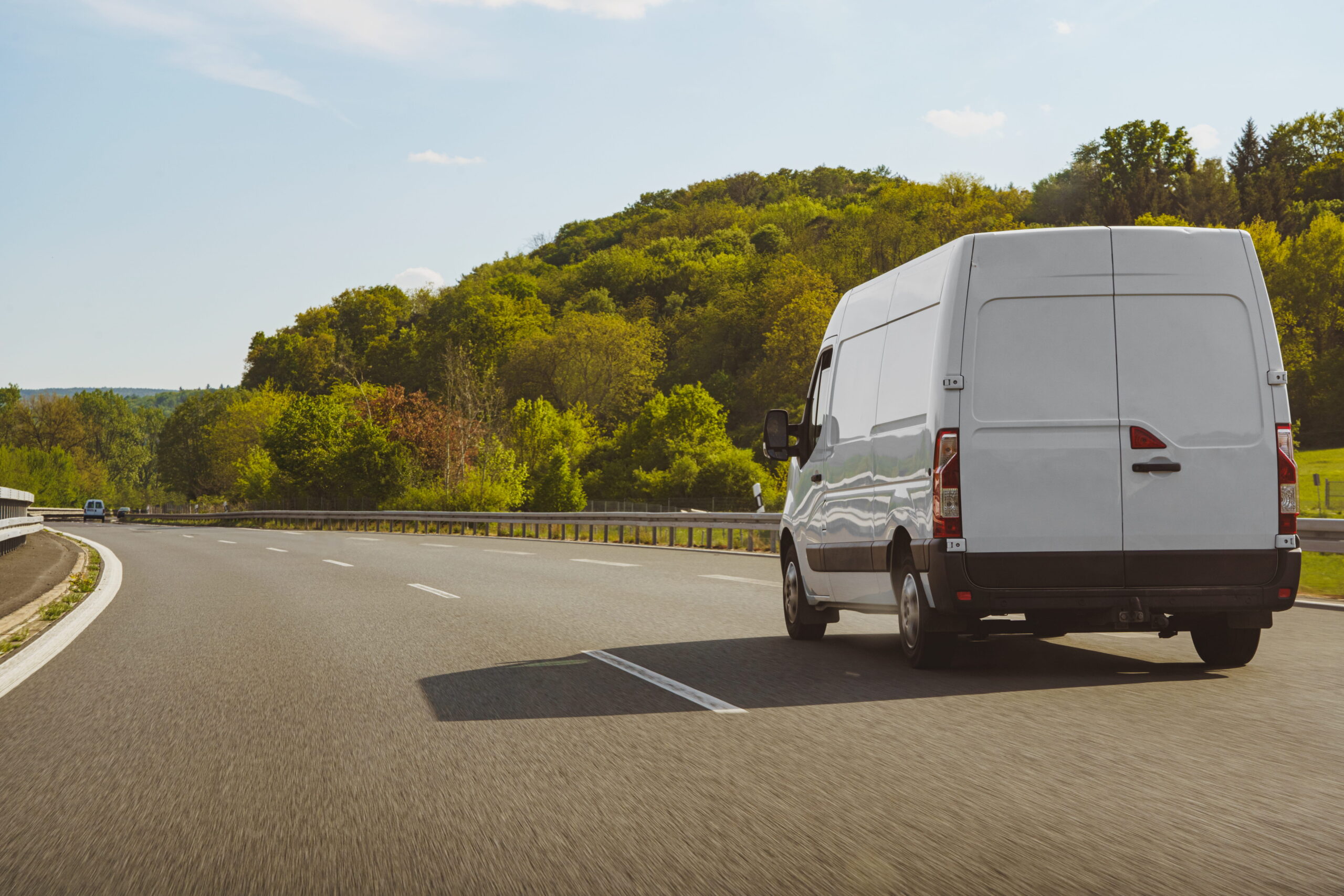 fast vans traveling on the highway